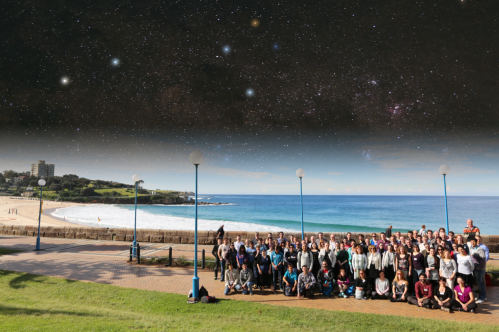 Conference Photo with the majority of the participants to the “Multiwavelength Dissection of Galaxies” meeting, 24th - 29th  May 2015. The background is an image of the Southern sky showing the Southern Cross and the Pointers. Credit: Conference Photo: Andy Green (AAO), Background image & composition: Ángel R. López-Sánchez.